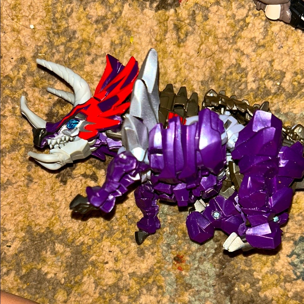 Purple and Red Dinosaur Toy